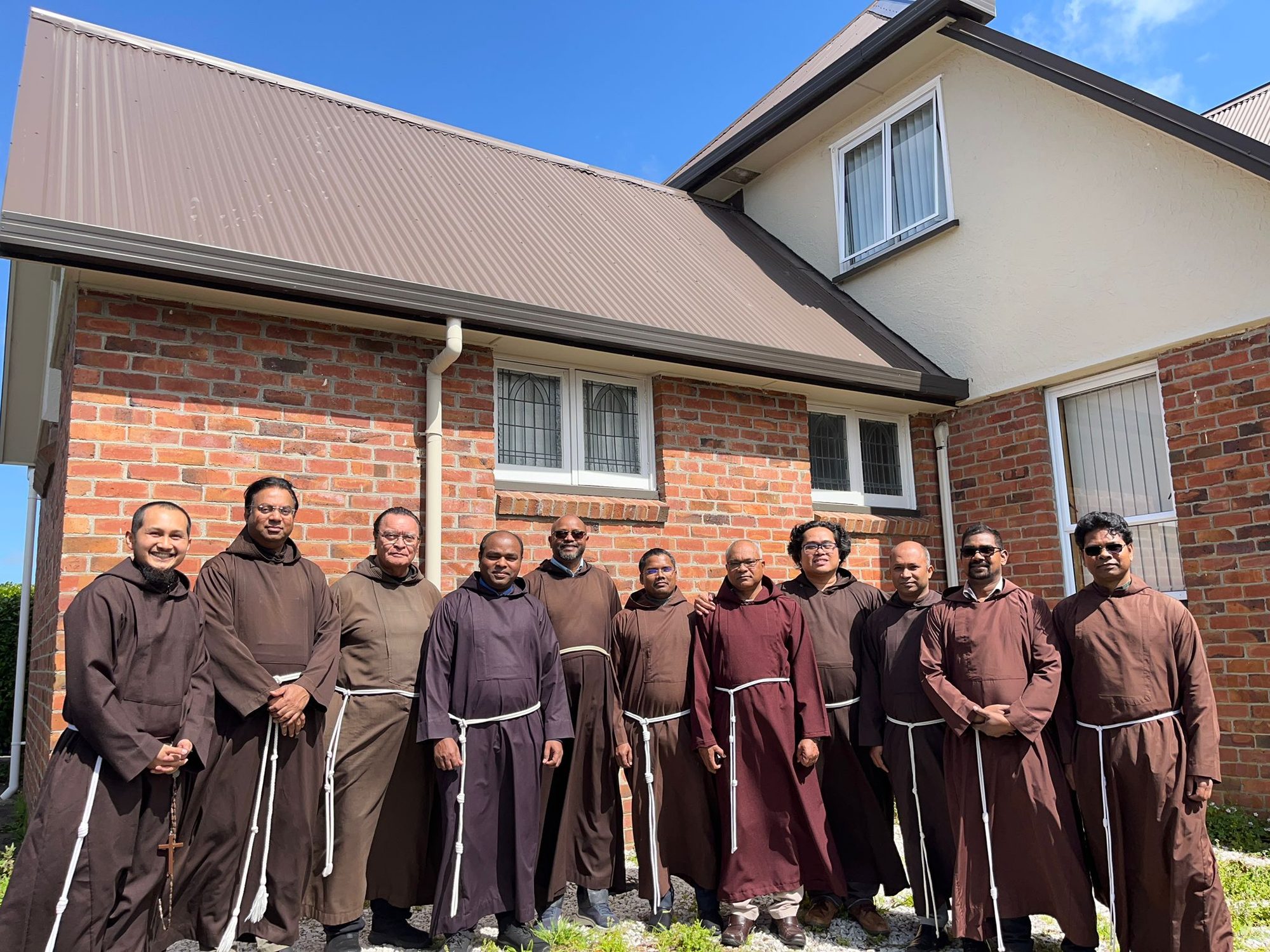 The Capuchin friars of Aotearoa New Zealand gathered outside the friary