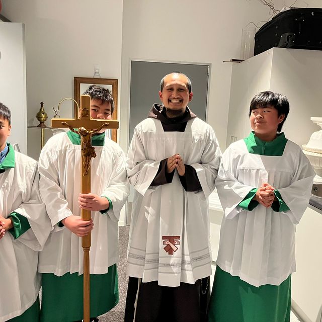 With the altar servers