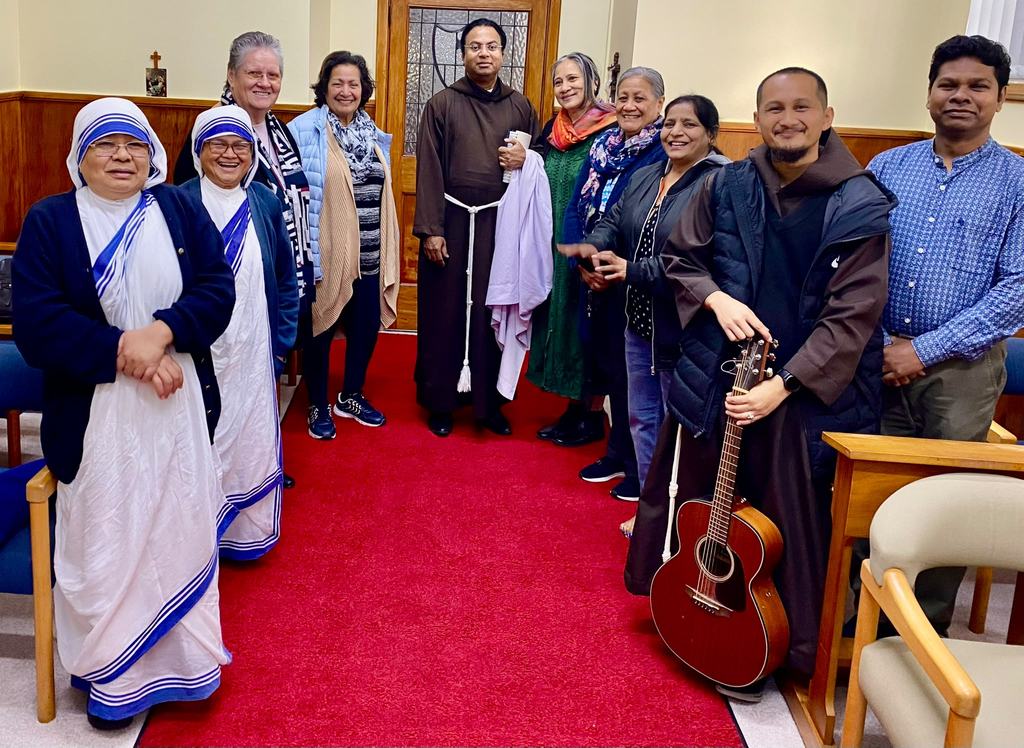 Religious sisters and parishioners together